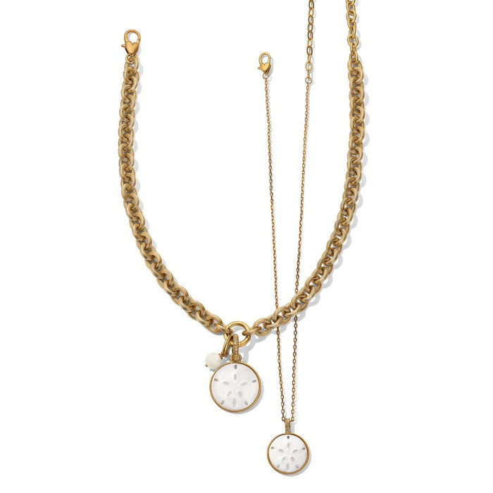 Brighton gold-plated chain necklaces with mother-of-pearl shell sand dollar pendants in two chain styles on a white background