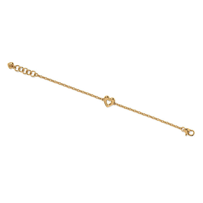 Brighton gold-plated chain bracelet with open heart station, lobster clasp, and extender chain on a white background