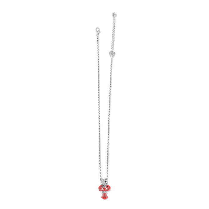 Brighton necklace with silver-plated chain and red enamel lobster pendant with crystal accents on a white background
