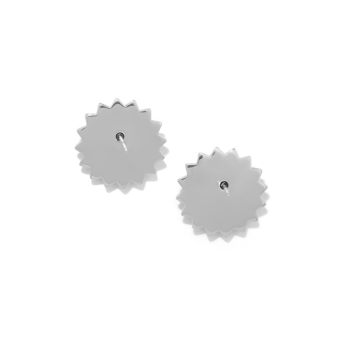 Brighton stud earrings shown from the back with silver-tone sunburst-shaped settings and posts on a white background