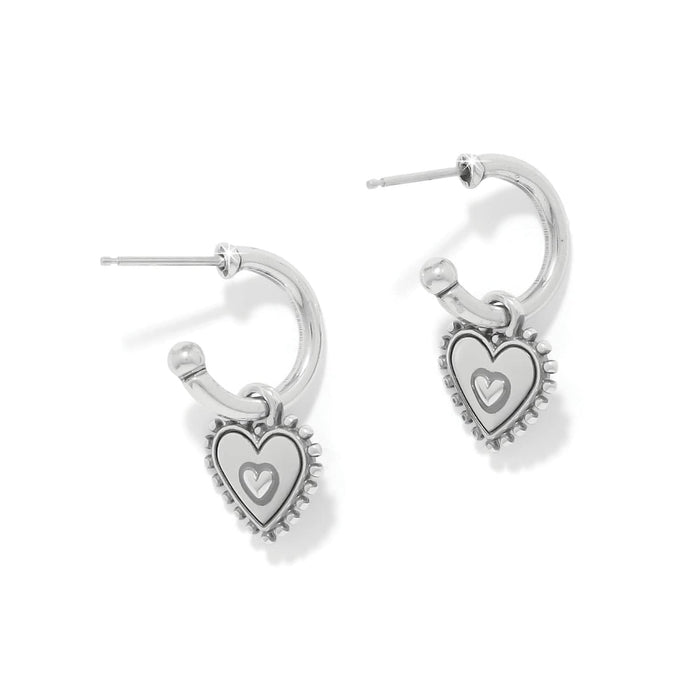 Brighton hoop earrings with silver-plated heart charms featuring white enamel and beaded edges on a white background