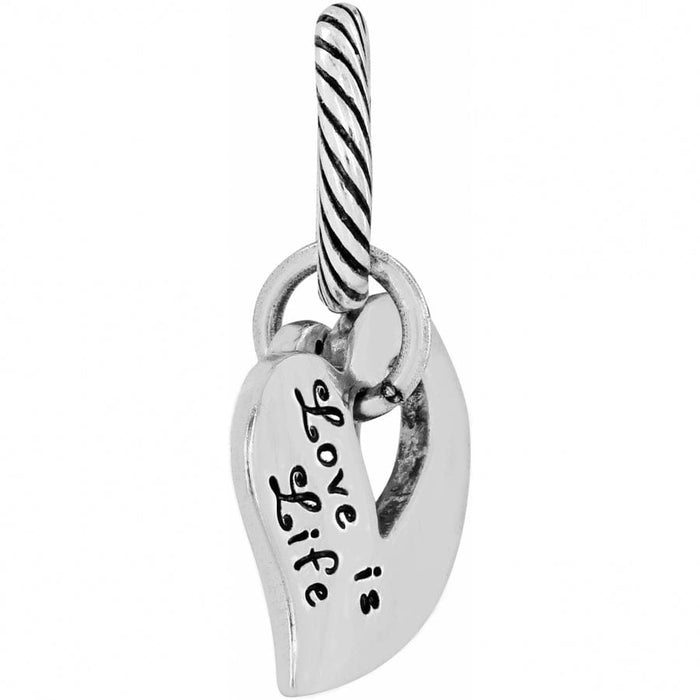 Brighton heart charm with engraved Love is Life script and silver-plated twisted bail on a white background