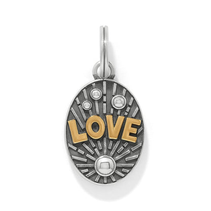 Brighton oval charm with silver-plated sunburst design and gold LOVE lettering on a white background