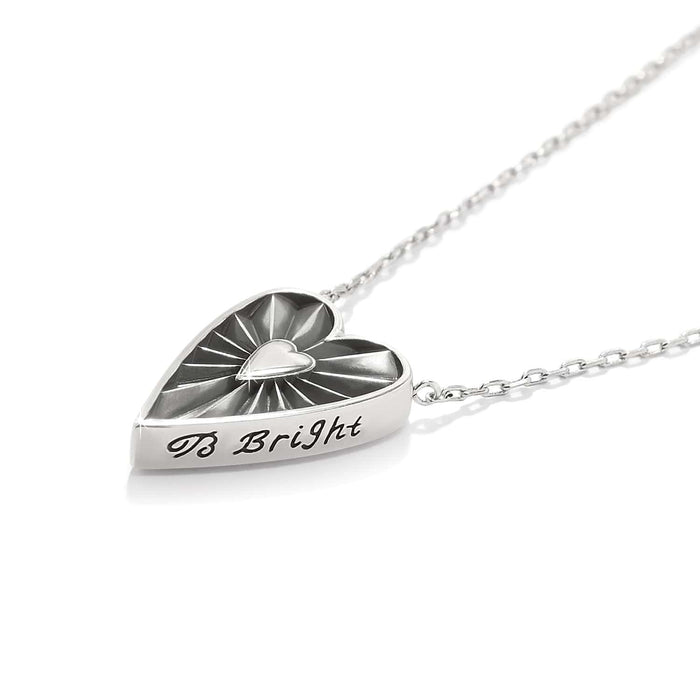 Brighton heart pendant necklace with radiant silver-tone design and engraved B Bright text on a white background