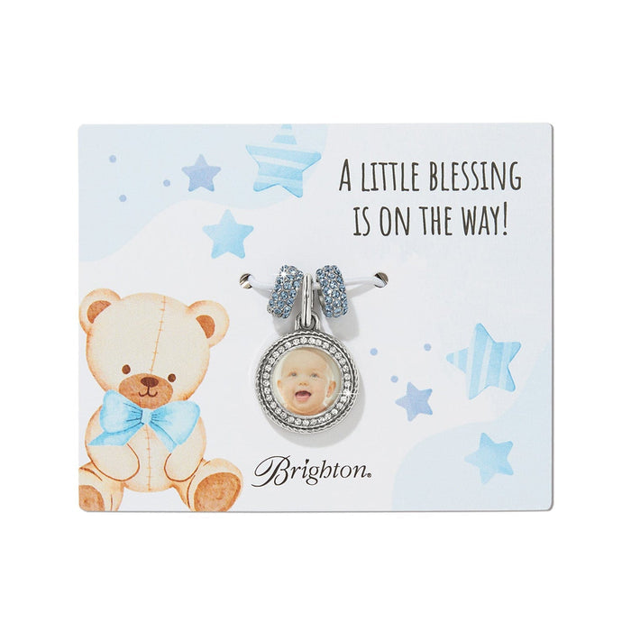 Brighton silver-plated charm with crystal-bordered baby photo and blue crystal beads on teddy bear gift card on a white background