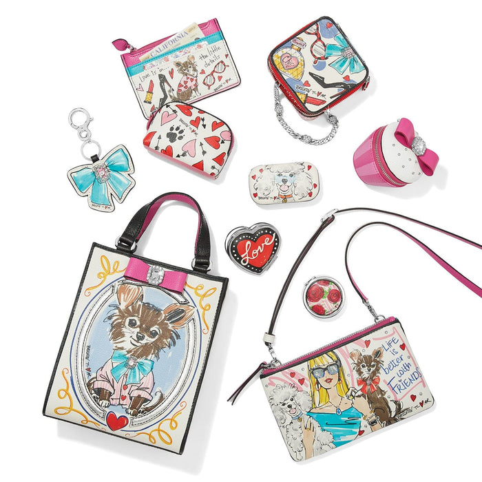Brighton handbag collection styled with illustrated dog prints, coin pouches, and other accessories on a white background