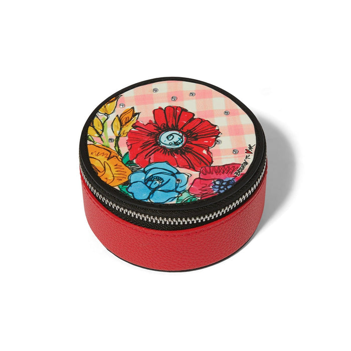 Brighton round leather jewelry case with red exterior, floral gingham print lid, and zipper closure on a white background