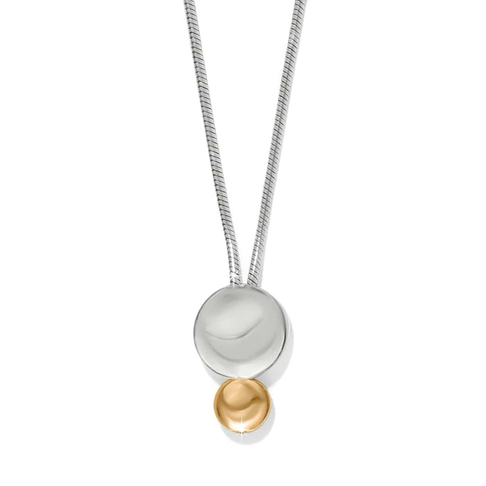 Brighton pendant necklace with two-tone silver and gold polished discs on a snake chain on a white background