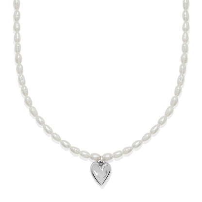 Brighton pearl necklace with rice pearls and silver-tone heart pendant on a white background