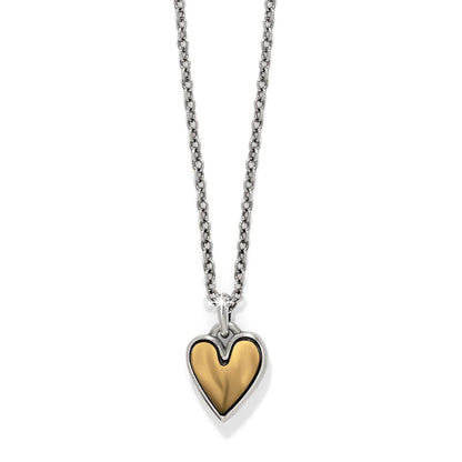 Brighton pendant necklace with two-tone heart pendant and silver-tone chain on a white background