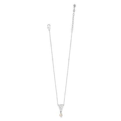 Brighton pendant necklace with silver-plated triangular charm and barque pearl drop on a white background