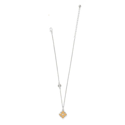Brighton silver-tone necklace with two-tone clover pendant, crystal accent, and adjustable chain on a white background