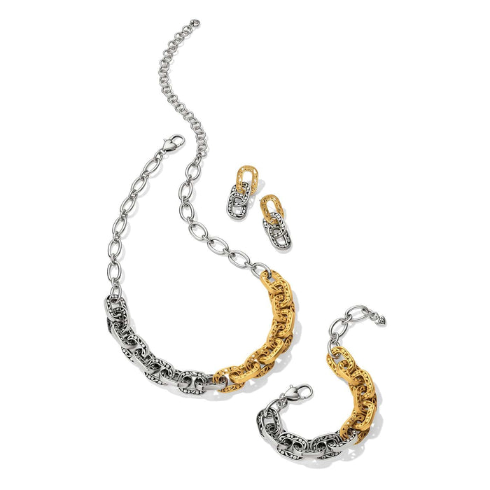 Brighton two-tone chain link necklace styled with matching bracelet and drop earrings on a white background