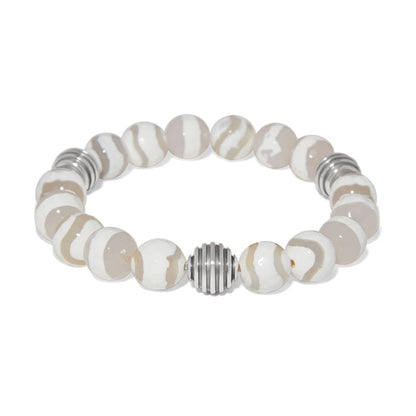 Brighton beaded bracelet with cream and tan swirled stones and silver-plated ribbed accent beads on a white background