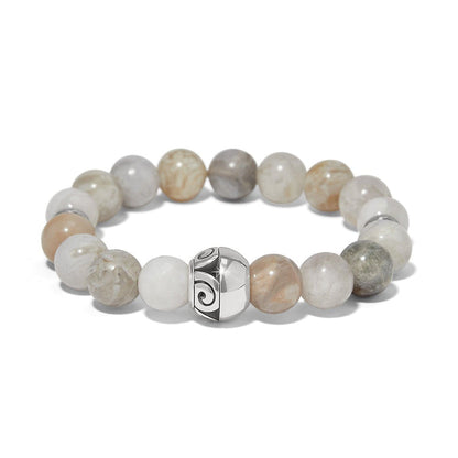 Brighton beaded stretch bracelet with cream and grey marbled stones and silver-plated scrollwork bead on a white background