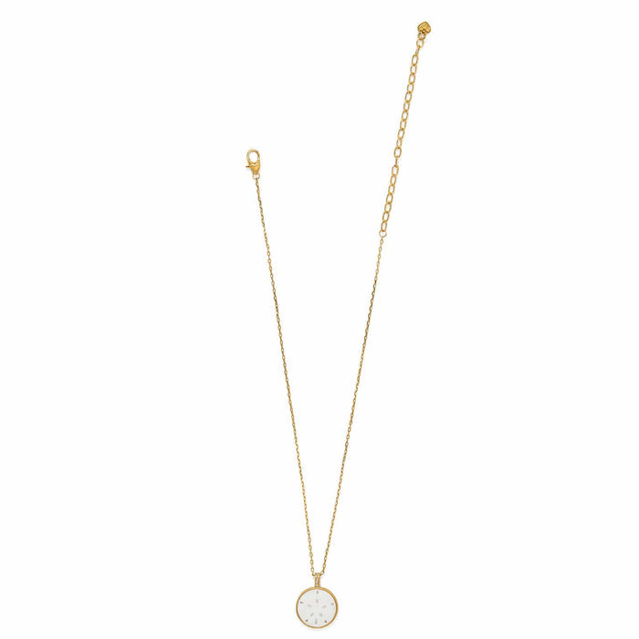 Brighton pendant necklace with mother-of-pearl sand dollar charm and gold-plated chain on a white background