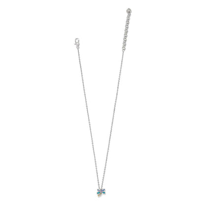 Brighton silver-plated necklace with small floral crystal pendant in blue, purple, and green tones on a white background