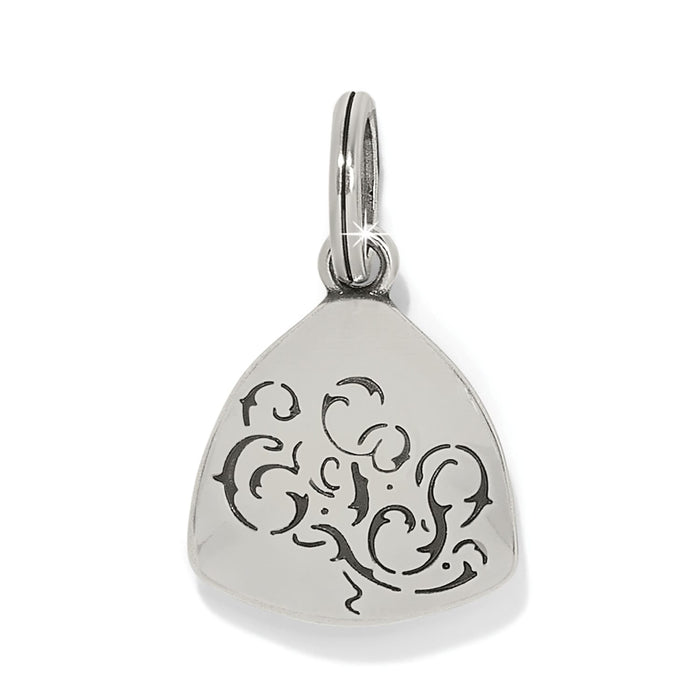 Brighton silver-plated charm with rounded triangular shape and engraved black scroll design on a white background
