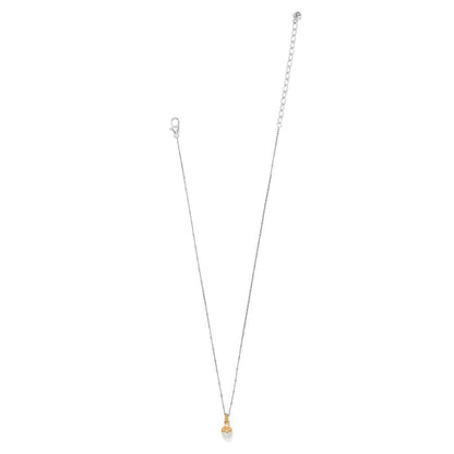 Brighton pendant necklace with glass pearl drop, gold-plated floral cap, and silver-tone beaded chain on a white background