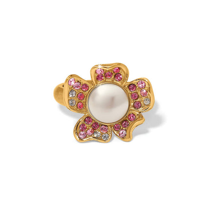Brighton gold-plated flower ring with glass pearl cabochon center and pink crystal petals on a white background