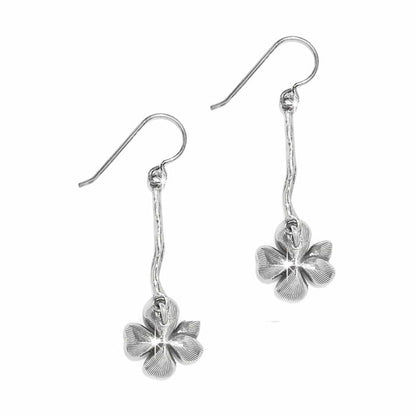 Brighton drop earrings with silver-plated flower charms suspended from slender textured bars on a white background