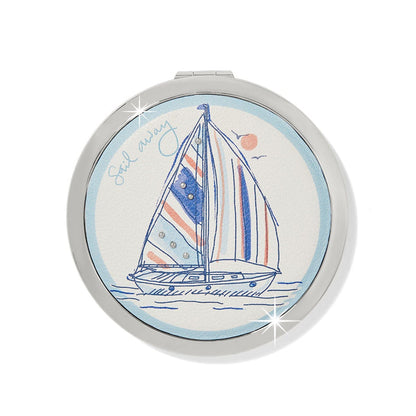 Brighton round compact mirror with illustrated sailboat print, sail away script, and silver-tone frame on a white background