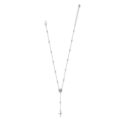 Brighton rosary necklace with silver-plated chain, crystal beads, round medallion, and crucifix drop on a white background