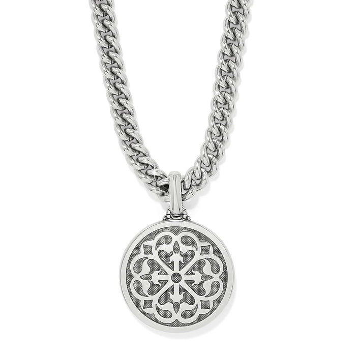 Brighton pendant necklace with silver-plated openwork medallion and curb chain on a white background