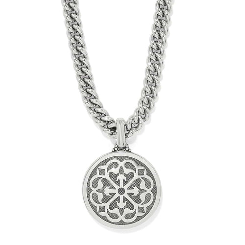 Brighton pendant necklace with silver-plated openwork medallion and curb chain on a white background
