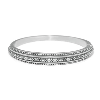 Brighton bangle bracelet with silver-plated finish and ridged textured band detailing on a white background