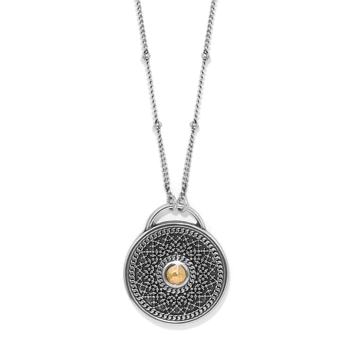 Brighton pendant necklace with two-tone medallion, silver beaded chain, and gold hammered center accent on a white background