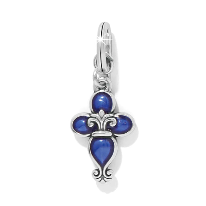 Brighton charm with silver-plated fleur-de-lis cross design and blue enamel detailing on a white background