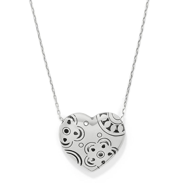 Brighton heart pendant necklace with silver-plated finish and engraved swirl patterns on a white background