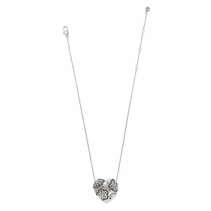 Brighton silver-plated heart pendant necklace with swirl patterns and crystal accents on a white background