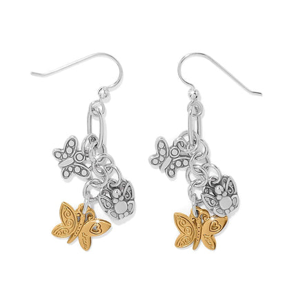 Brighton drop earrings with two-tone butterfly and flower charms in silver and gold finish on a white background