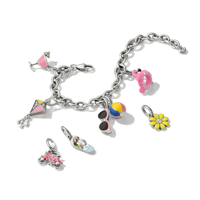 Brighton silver-plated charm bracelet styled with enamel summer-themed charms including flamingo, beach ball, and other accessories