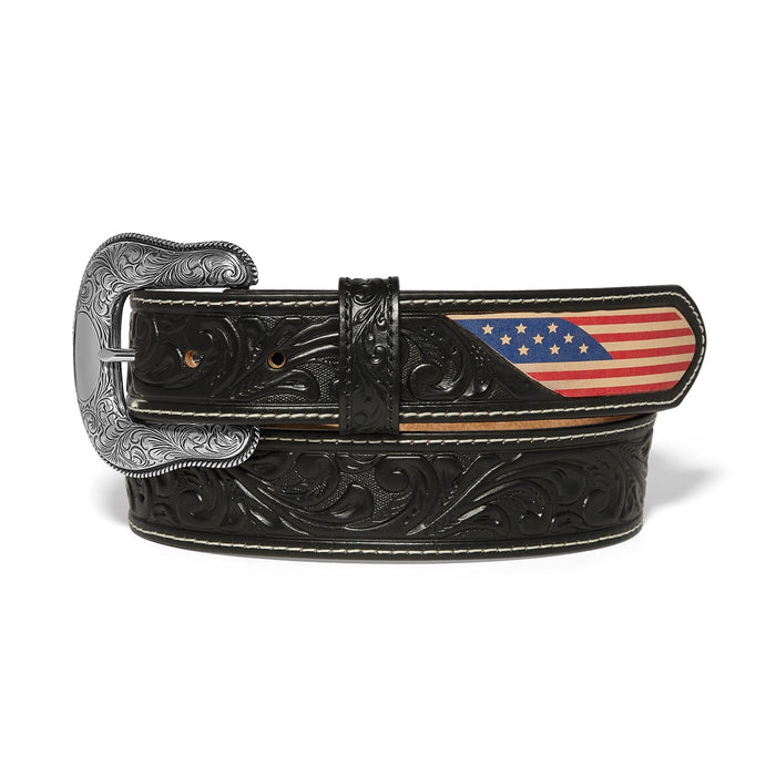 Brighton black tooled leather belt with American flag accent and ornate silver-tone engraved buckle on a white background
