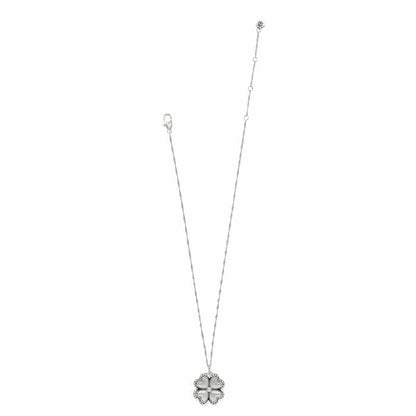 Brighton silver-plated pendant necklace with crystal-trimmed four-leaf clover charm and twisted chain on a white background