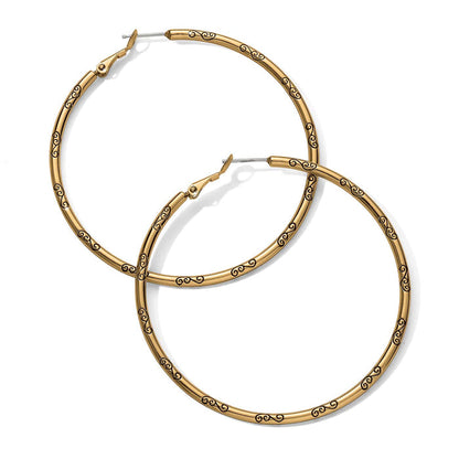 Brighton hoop earrings in gold-plated finish with engraved scroll detail along the hoops on a white background
