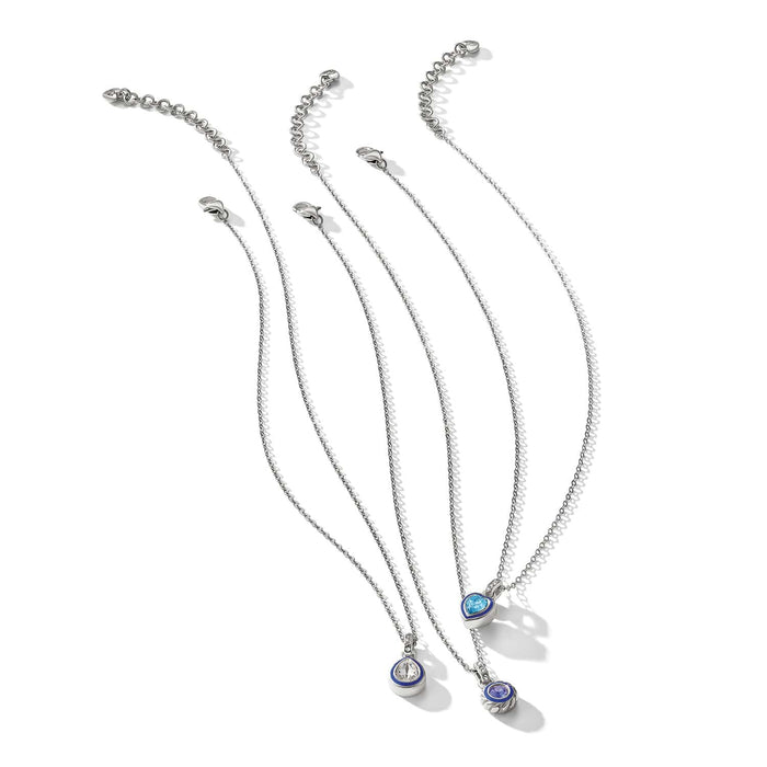 Brighton pendant necklaces with crystal, blue enamel, and silver-plated accents on a white background