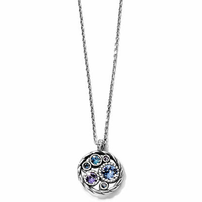 Brighton pendant necklace with silver-plated round cluster of blue and purple crystals on a white background