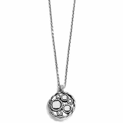 Brighton pendant necklace with silver-plated round medallion featuring circular bubble motifs and rope trim on a white background
