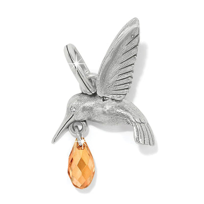 Brighton hummingbird charm with silver-plated finish and faceted amber crystal drop on a white background