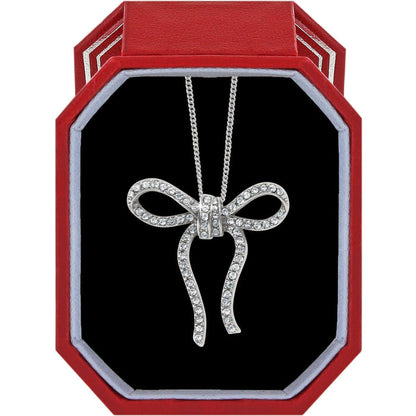 Brighton bow pendant necklace with silver-plated finish and crystal accents displayed in a red gift box