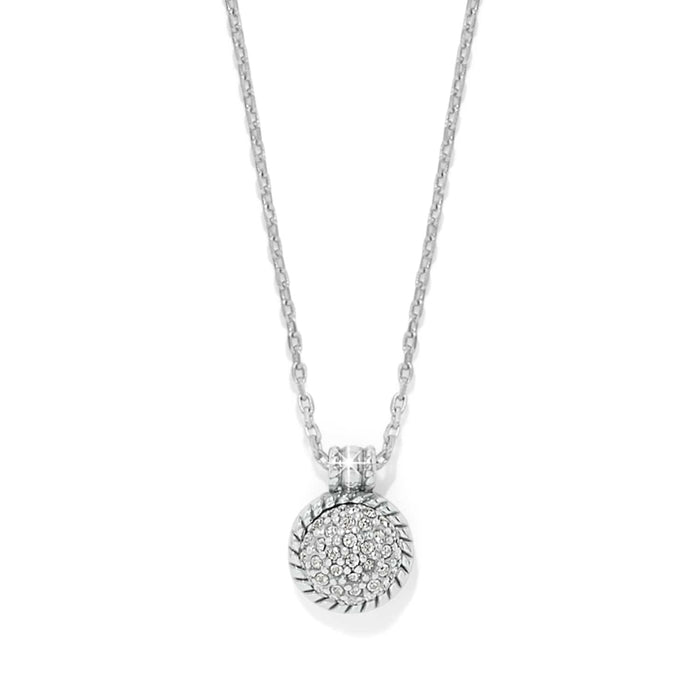Brighton pendant necklace with silver-plated round disc, crystal pavé center, and rope-textured border on a white background