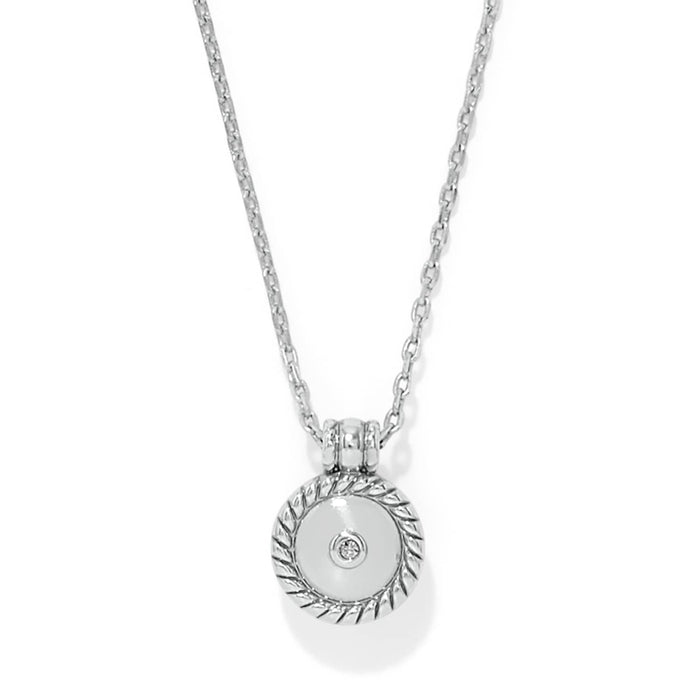 Brighton pendant necklace with silver-plated round medallion, rope-twist border, and crystal accent on a white background