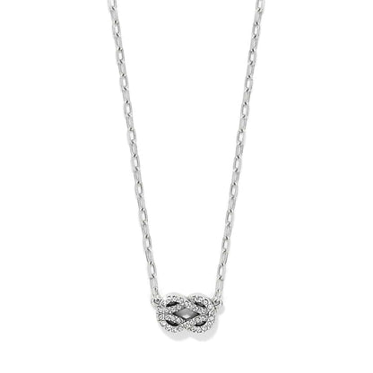 Brighton pendant necklace with silver-plated infinity knot, crystal accents, and delicate chain on a white background