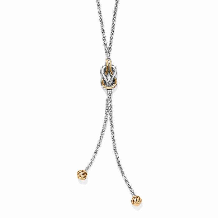 Brighton lariat necklace with two-tone knot pendant, silver chain, and gold beaded drop ends on a white background