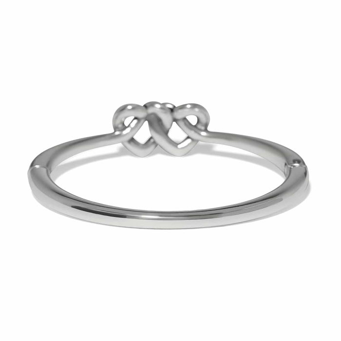 Brighton ring shown from the back with silver-plated slim band and interlocking double heart design on a white background
