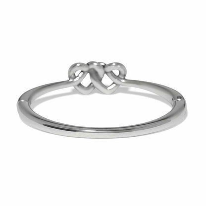 Brighton ring shown from the back with silver-plated slim band and interlocking double heart design on a white background